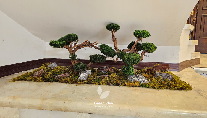 نمونه کار | استفاده از شاخه و خزه تثبیت شده برای ساخت باغچه در کتابخانه باهنر